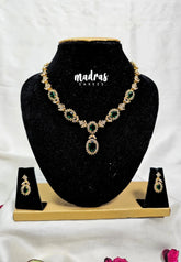 Premium 1 Gram Gold polish AD Stone Trendy Unique Design with Emerald Green Stone Necklace and Earrings