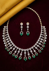 Moksha - Pure Silver Emerald Green Diamond Necklace Set with Matching Earrings | Real Gold Finish | Luxury Designer Bridal Jewellery for Women