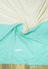 Half white with turquoise blue - Blush & Breeze – Reversible Kerala Mul Cotton Saree