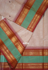 Pastel Beige Brown - Karthigai silk cotton with buttas annam small temple rettapet border - Best for Wedding Functions