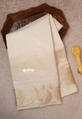 Half White - Madhuram - Soft Matka silk with grooves body and floral border