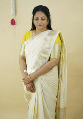 Half White - Madhuram - Soft Matka silk with grooves body and floral border