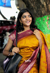 Turmeric Orange - Thendral - Kanchi semi silk buttas body rettapetta border