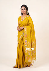 Greenish Yellow - Vadhanam - Jute Tussar Silk Saree Colorful Flower Weaving Border with Leaf Buttas - Perfect for Diwali Festive