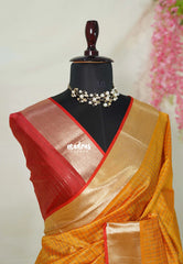 Sunlit Mustard Orange - Manjari - semi tussar checks in body with tissue border