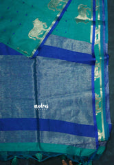 Teal blue - Manjari - Premium raw silk with full weaving buttas pichwai cow border