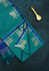 Teal blue - Manjari - Premium raw silk with full weaving buttas pichwai cow border