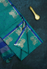 Teal blue - Manjari - Premium raw silk with full weaving buttas pichwai cow border