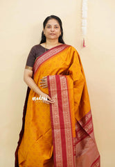 Turmeric Orange - Thendral - Kanchi semi silk buttas body rettapetta border