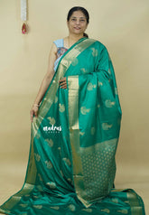 Emerald Green - Sri valli pure satin silk with peacock buttas and gold zari border