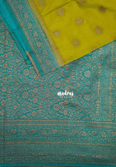 Muted Sap Green - Durga - Traditional Banarasi Khadi Georgette Silk Saree Floral Border with Contrast Pallu and Blouse & Buttas - Perfect for Diwali Festive | Wedding Functions