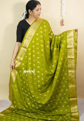 Sap Green - Vadhanam - Premium Jute Tussar silk with buttas and gold zari border