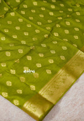 Sap Green - Vadhanam - Premium Jute Tussar silk with buttas and gold zari border