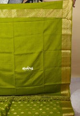 Sap Green - Vadhanam - Premium Jute Tussar silk with buttas and gold zari border