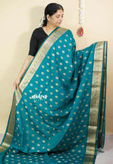 Teal Blue - Vadhanam - Premium Jute Tussar silkwith buttas and gold zari border