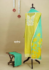 Amitha – Lime Yellow Chanderi silk salwar suit with digital printed dupatta cotton bottom