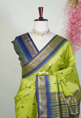 Pretty Parrot Green - Manjari - Raw Silk Saree with Yannai Border and Buttas - Best for Small Functions