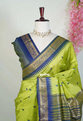 Pretty Parrot Green - Manjari - Raw Silk Saree with Yannai Border and Buttas - Best for Small Functions
