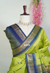 Pretty Parrot Green - Manjari - Raw Silk Saree with Yannai Border and Buttas - Best for Small Functions