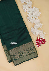 Dark Green - Madhuram - Soft Matka silk with grooves body with traditional border