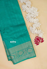 Teal Green - Madhuram - Soft Matka silk with grooves body with traditional border