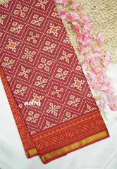 Soft Muslin cotton patola prints with tissue border - crimson red