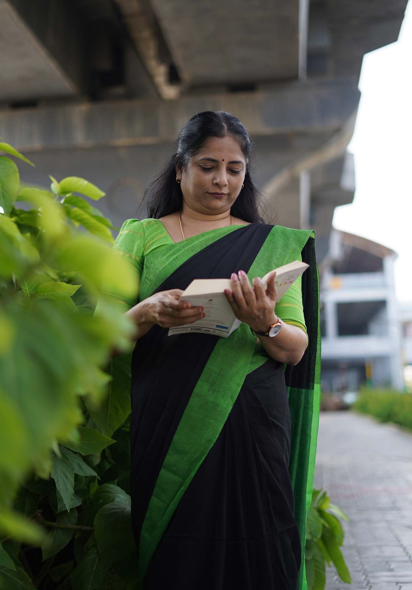 Ambuja Border khadi black with green - Madras Sarees