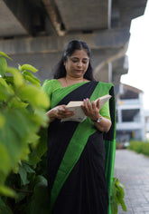 Ambuja Border khadi black with green - Madras Sarees