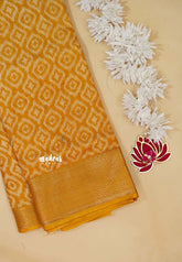 Turmeric Yellow - Silky Georgette with Ikkat Prints and Zari Border