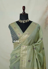 Muted Pista Green - Soft Muslin Silk with Paithani Border Rich Thread Weaving Floral Pallu - Perfect for Office Wear | Summer Wear