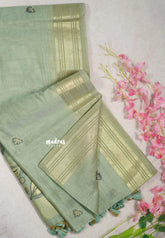 Muted Pista Green - Soft Muslin Silk with Floral Weaving Pallu and Zari Border - Perfect for Office Wear | Summer Wear