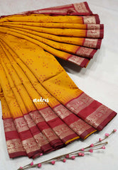 Turmeric Orange - Thendral - Kanchi semi silk buttas body rettapetta border