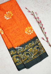 Orange - Uniform sarees Malgudi printed silk with batik prints