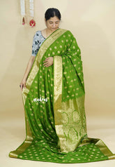 Pretty Parrot Green - Vadhanam - Premium Jute Tussar silk with buttas and gold zari border