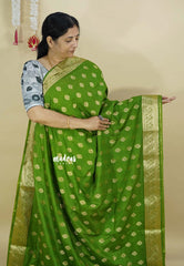 Pretty Parrot Green - Vadhanam - Premium Jute Tussar silk with buttas and gold zari border