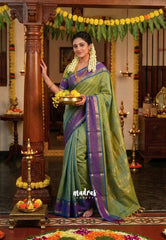 Dual shade Pista Green - Vaibhogam 120 count Pure mercerized silk cotton with buttas and rettapet border