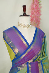 Dual shade Pista Green - Vaibhogam 120 count Pure mercerized silk cotton with buttas and rettapet border