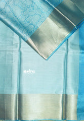 Sky Melody Blue - Ahaana -  Nita Ambani inspired semi silk with floral emboss weaving plain border