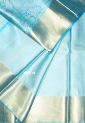Sky Melody Blue - Ahaana -  Nita Ambani inspired semi silk with floral emboss weaving plain border