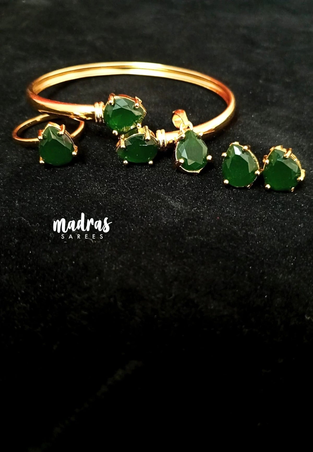 Premium 1 Gram Gold Polish Combo Set of Bracelet, Ring, Pendant and Earings with Emerald Green Stone for Women