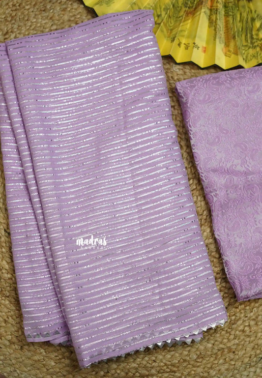 Madhubala Fancy silk with Gota Patti zari pastel lavender with grand blouse