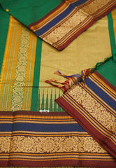 Korvai silk cotton rich thread border with small buttas Green color with blue border