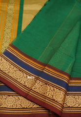 Korvai silk cotton rich thread border with small buttas Green color with blue border