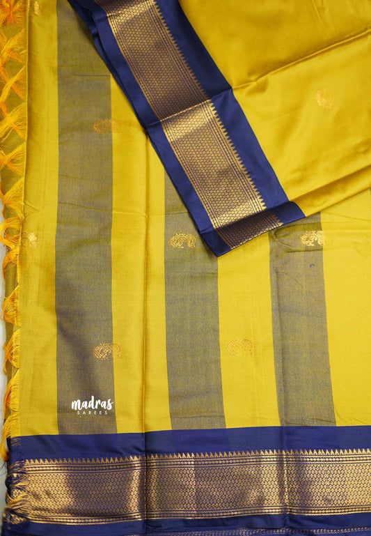 Sico Gadwal semi silk yellow body with dark blue border saree