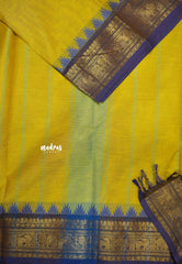 Karthigai silk cotton Plain body annam yazhi and temple border - Greenish yellow