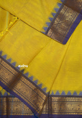 Karthigai silk cotton Plain body annam yazhi and temple border - Greenish yellow
