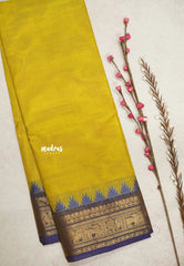 Karthigai silk cotton Plain body annam yazhi and temple border - Greenish yellow