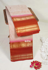 Beige Peach - Karthigai Mercerised cotton with buttas annam small temple rettapet border - Best for Wedding Functions