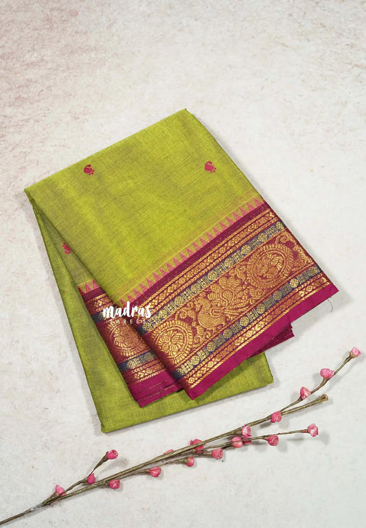 Dual shade Parrot Green - Karthigai silk cotton temple sculpture border with Buttas