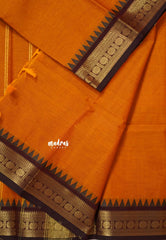 Sunset Orange  - Karthigai silk cotton plain body rudraksha with temple weaving border